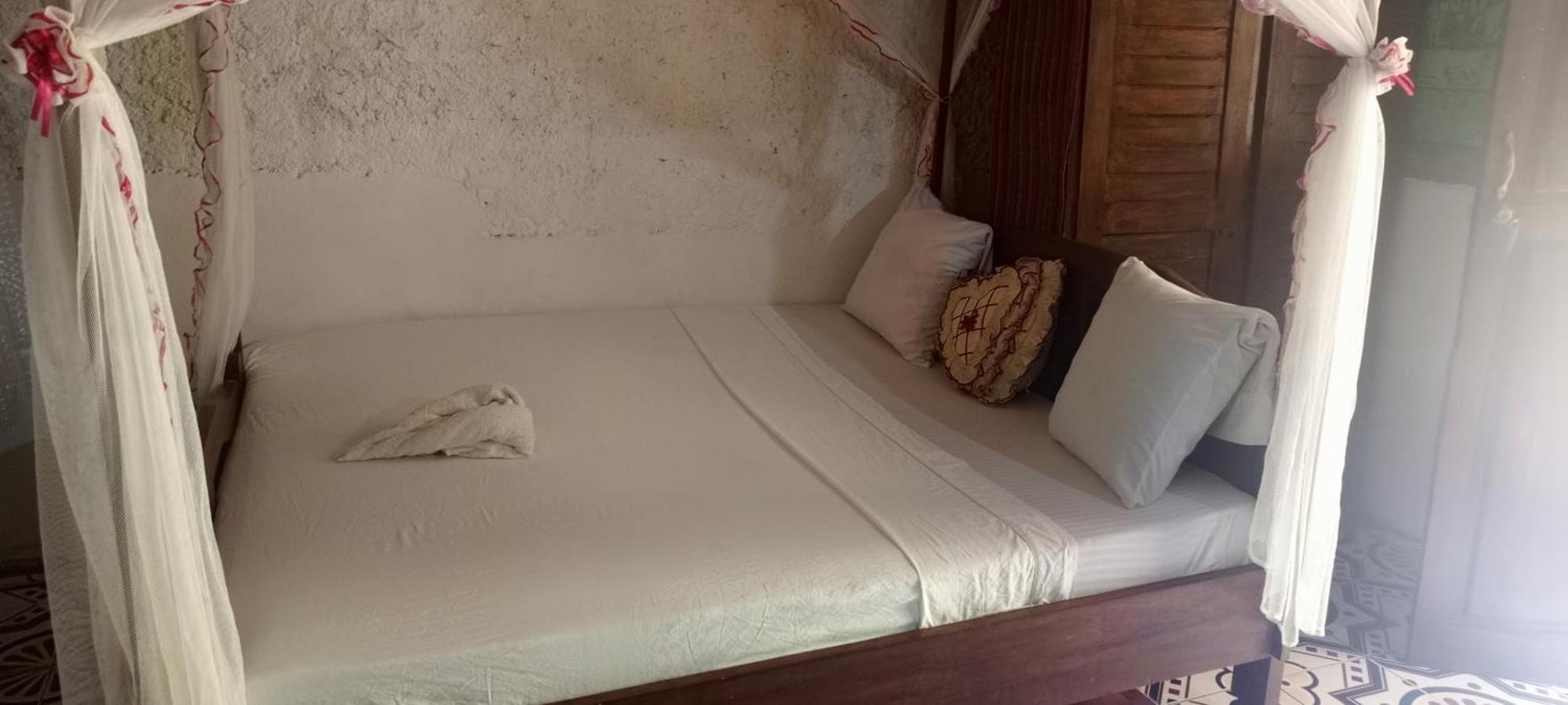 Piscine Bimoko Hotel นูซีเบ ภายนอก รูปภาพ