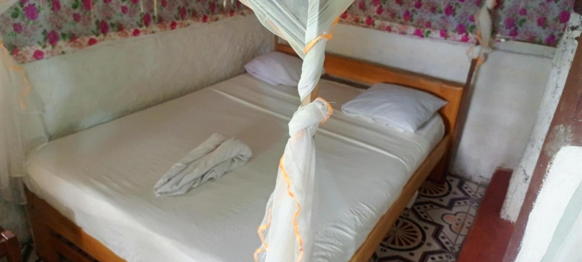 Piscine Bimoko Hotel นูซีเบ ภายนอก รูปภาพ