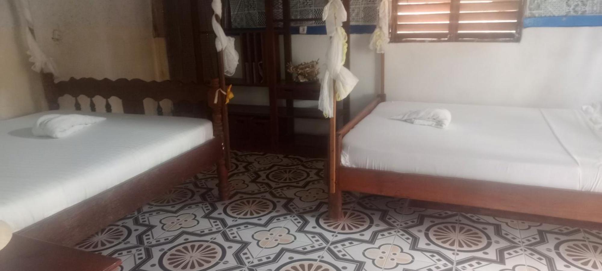 Piscine Bimoko Hotel นูซีเบ ภายนอก รูปภาพ